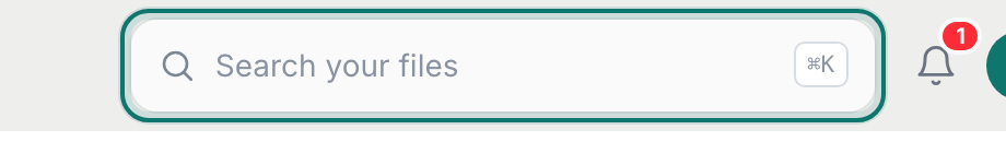 The Search your files box at the top of the window, with the bell and your avatar beside it